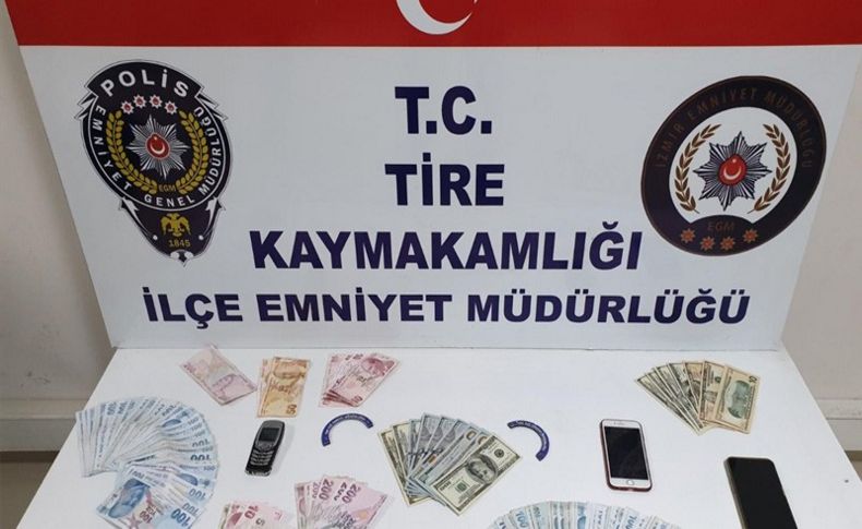 İzmir'de yaşlı kişiyi dolandırdığı iddia edilen 2 zanlı yakalandı