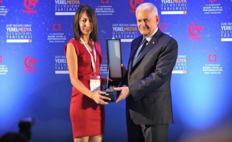 İzmirli gazeteci Karakoyun'a büyük onur