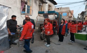 Kızılay çalışanının tabanca ile vurulduğu mahallede yemek dağıttı