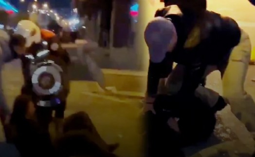 İzmir'de polis genç kadını sırtına diziyle basarak gözaltına aldı, sürükledi