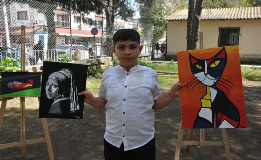 10 yaşındaki otizmli Hasan, ilk resim sergisini açtı