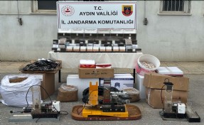 Aydın'da kendi sardıkları tütünleri piyasaya sürmeye çalışan 2 şüpheliye gözaltı