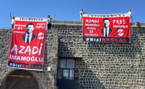 Tarihi surlarda İmamoğlu pankartı açan kişiler gözaltına alındı