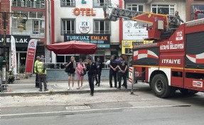 Emlak ofisinde çıkan yangında 6 kişi dumandan etkilendi