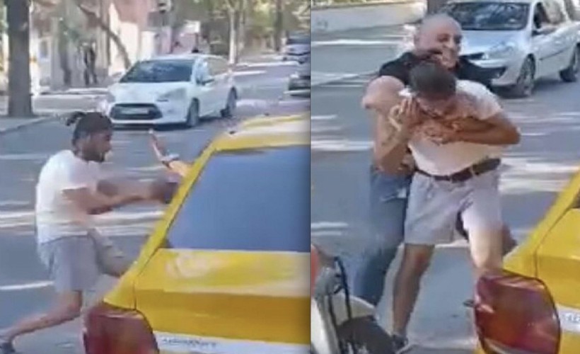 İzmir'de trafikte kasklı, tekmeli ve yumruklu kavga kamerada