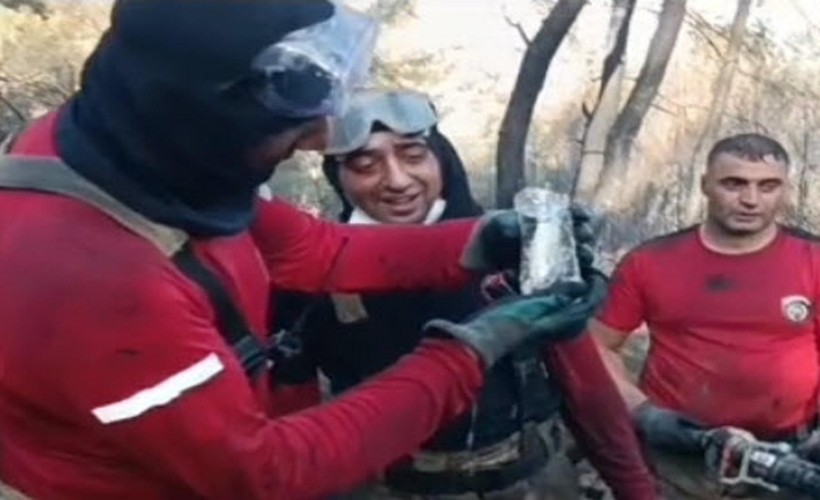 Yangında can çekişen balığı itfaiye kurtardı
