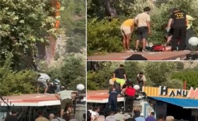 Fethiye'de yamaç paraşütü ağaca takılınca işletmenin çatısına indi: 1 yaralı