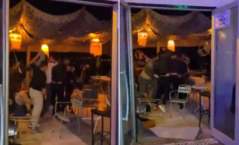 Kız meselesi yüzünden otobüslerle mekan bastılar: Sandalyeler havada uçuştu!