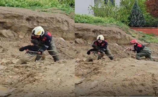 Torbalı'da çamura saplanan iki çocuğu itfaiye kurtardı