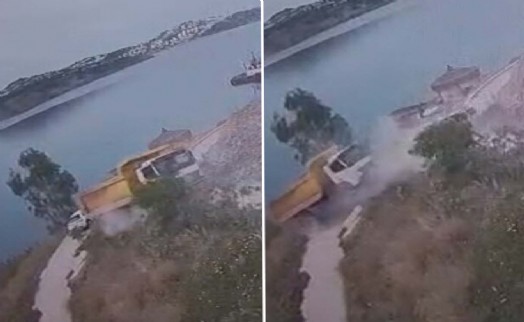 Kaza anı saniye saniye kaydedildi: Hafriyat kamyonu deniz kıyısında askıda kaldı!