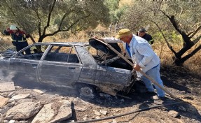 Yanan otomobilini uzaklaştırıp, alevlerin ormana sıçramasını önledi