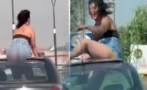 Araç üzerinde 'hayasızca hareketlerde' bulunan kadın ve sürücü gözaltına alındı