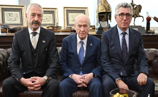 Bahçeli, Sarallar ve Şahinler aileleriyle MHP Genel Merkezi’nde bir araya geldi