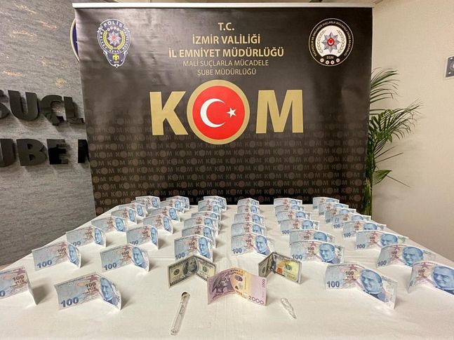 İzmir'de sahte parayla akaryakıt aldıkları belirlenen 2 şüpheli yakalandı