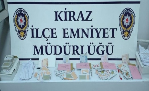 İzmir'de 'Okuma-Yazma Derneği'ne kumar baskını