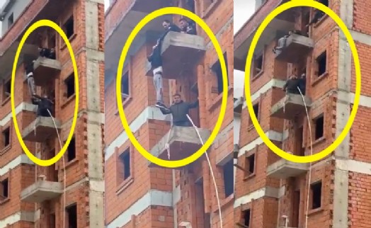 İntihar girişiminde bulunduğu binada dakikalarca asılı kaldı
