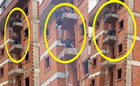 İntihar girişiminde bulunduğu binada dakikalarca asılı kaldı