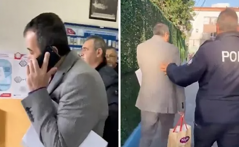 İzmir'de sandık görevlilerine AK Parti logolu kalem dağıtmak istedi