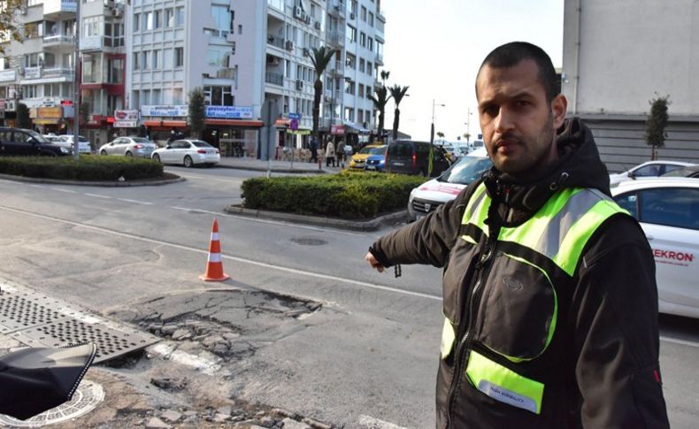 Asfalttaki göçük nedeniyle kaza geçirdi