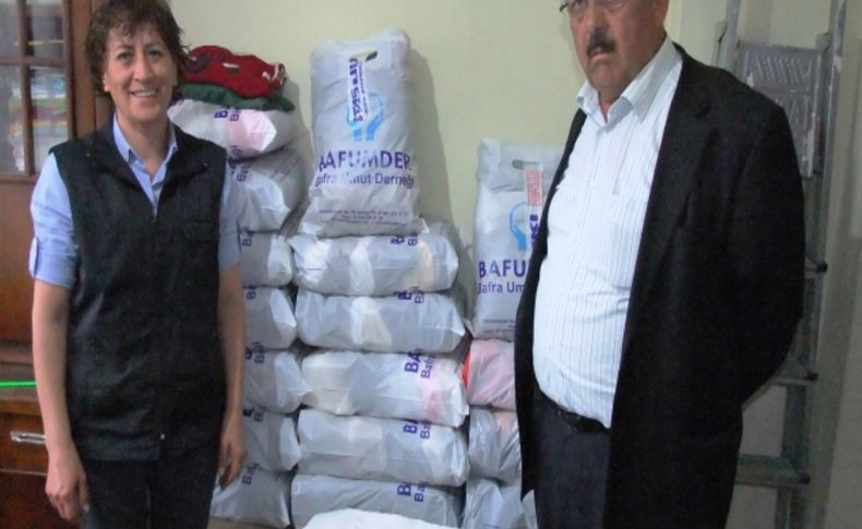 BAFUMDER'den Kasnakçı Mermer'e giysi yardımı