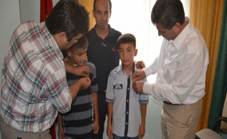 Başarılı güreşçiler altınla ödüllendirildi