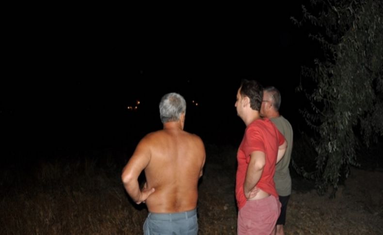 Burhaniye’de makilik alanda çıkan yangın tatilcileri korkuttu