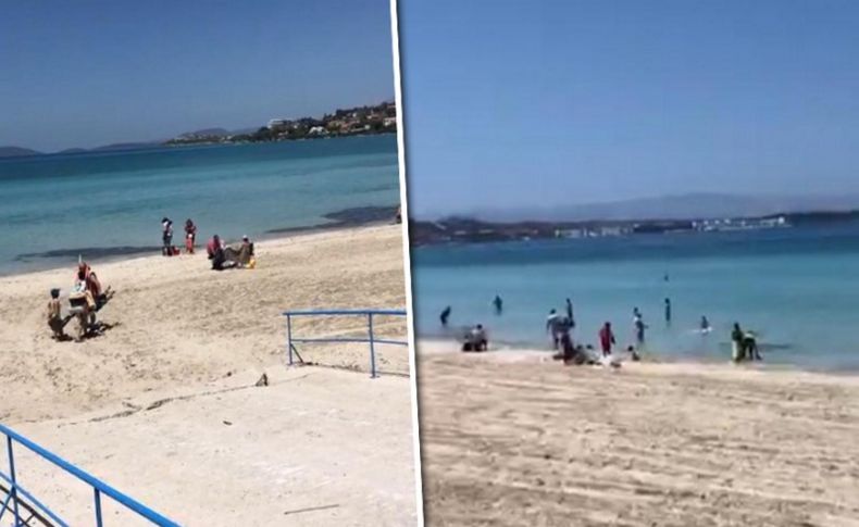 Çeşme'de ve Foça'da çocuklar 4 saatlik izinde denize girdi