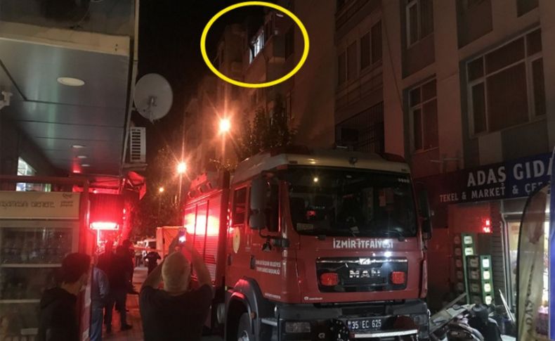 İzmir'de pencereden sarkarak polise direnen cezaevi firarisi ikna edilerek teslim oldu