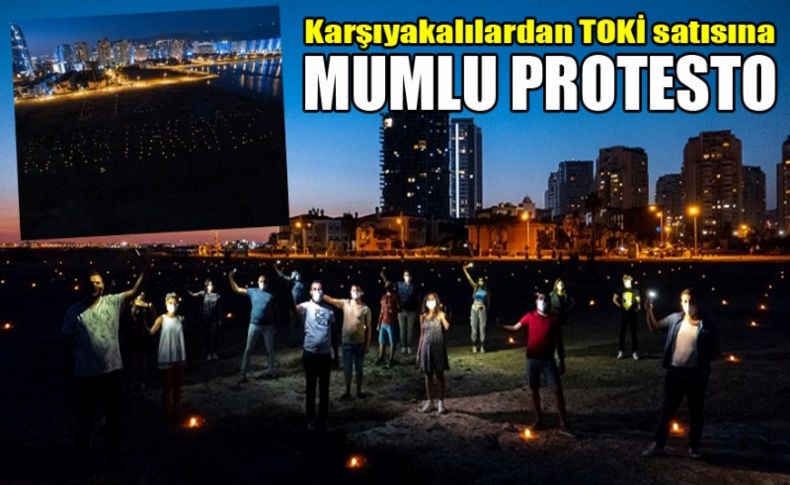 Karşıyakalılardan TOKİ satısına mumlu protesto