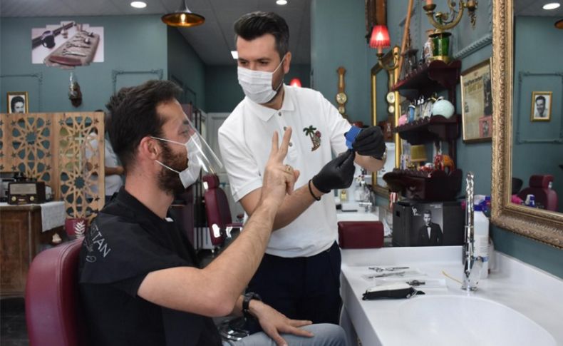 Kuaför ve berber salonlarında el işaretleriyle iletişim