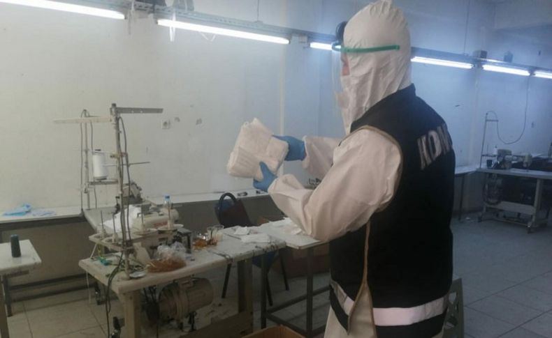Merdiven altı üretime baskın: 250 bin sahte maske...