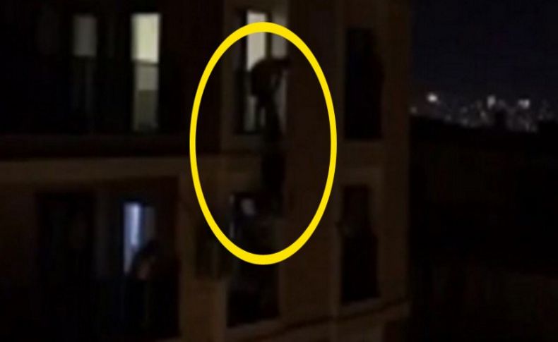 Sinir krizi geçirerek 5. kattan atlamaya kalkan kadını alt kattaki genç kurtardı