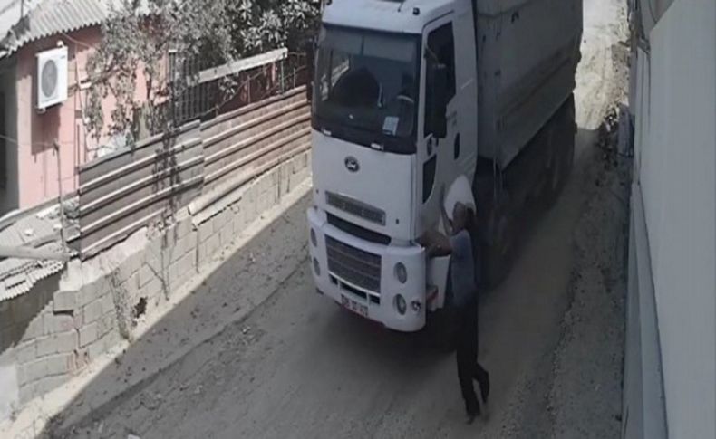 Yokuş aşağı giden kamyonu durdurmak istedi, başarılı olamadı